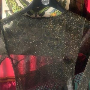 See-through shirt with flared sleeves